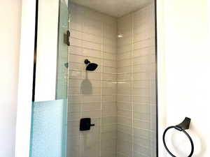 Bathroom with a tile shower