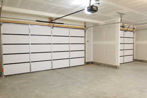 Garage featuring a garage door opener