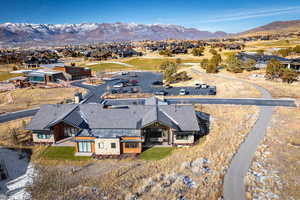 Birds eye view of property with a mountain view