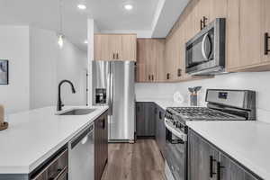 Kitchen has upgraded cabinetry and quartz countertops