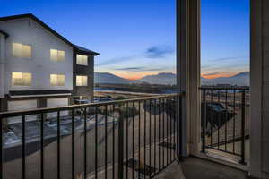 Balcony at dusk featuring mountain views of Mt Timpanogos