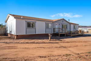 View of front facade with a deck