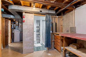 Basement featuring a workbench/workshop area