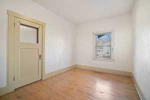 Spare room featuring light hardwood / wood-style floors