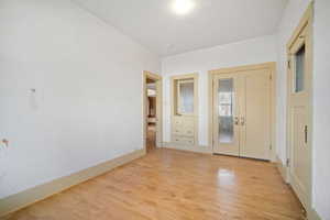 Empty room featuring light hardwood / wood-style floors