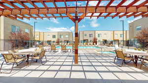 View of patio / terrace with a pergola and a community pool