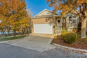 View of front of property featuring a garage