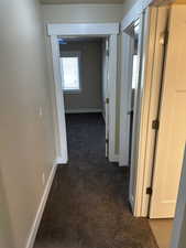 Corridor with dark carpet