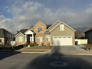 Craftsman-style home with a garage