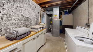 Washroom featuring separate washer and dryer