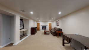 Living room featuring light colored carpet