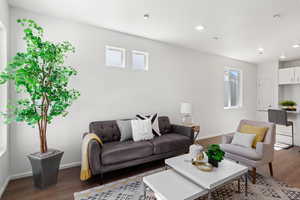 Living room featuring dark hardwood / wood-style floors