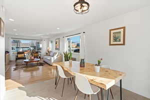 Dining room featuring lots of room and even more natural light