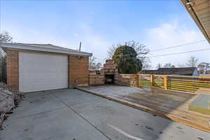 View of garage into back yard