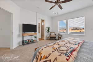 Bedroom with carpet flooring and ceiling fan