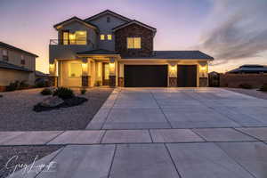 View of front of home with a balcony