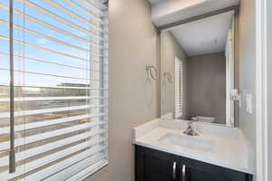 Bathroom with vanity and toilet