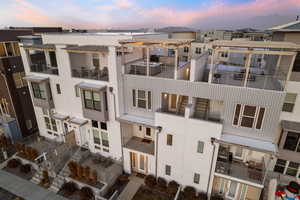 View of outdoor building at dusk