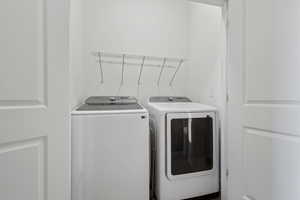 Clothes washing area with separate washer and dryer