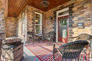 View of patio featuring a porch