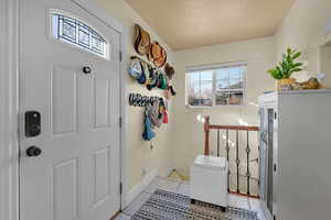 Interior space featuring light tile patterned floors