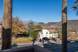 Exterior space with a mountain view and a garage