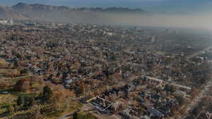 Birds eye view of property with a mountain view