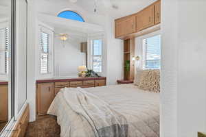 Bedroom featuring carpet floors and ceiling fan