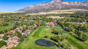 Aerial view featuring a water and mountain view