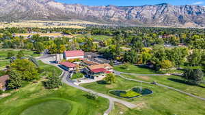 Aerial view with a mountain view and Golf Couse