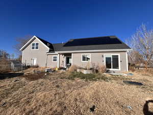 Back of property with solar panels