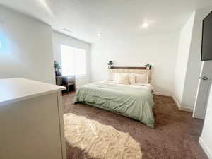 Bedroom with carpet flooring