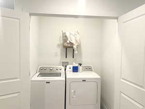 Clothes washing area with washing machine and dryer