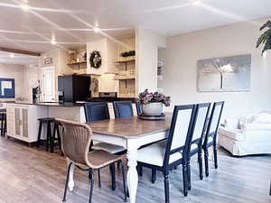 Dining room with wood-type flooring