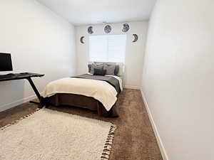 Bedroom featuring carpet flooring