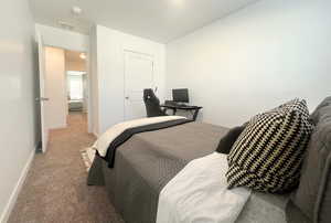 View of carpeted bedroom