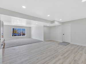 Spare room with light wood-type flooring