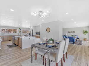 Dining area featuring light wood-type flooring