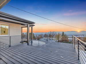 View of deck at dusk