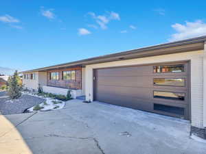 Ranch-style house with a garage