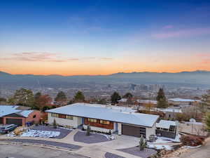 Exterior space featuring a mountain view and a garage