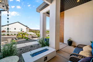 View of patio / terrace featuring an outdoor fire pit