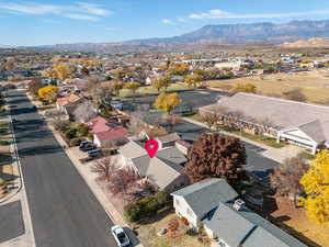 Birds eye view of property featuring a mountain view