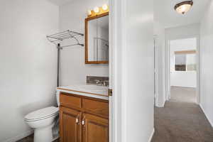 Bathroom with vanity and toilet