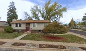 View of front of home with a front lawn