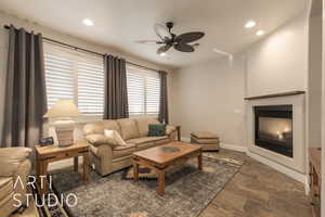 Living room featuring ceiling fan