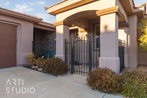 View of gated doorway to property