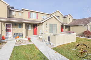 View of front of property featuring a front yard