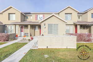 View of front of property with a front lawn