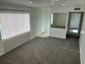 View of carpeted spare room
